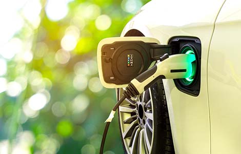 Electric vehicle plugged in