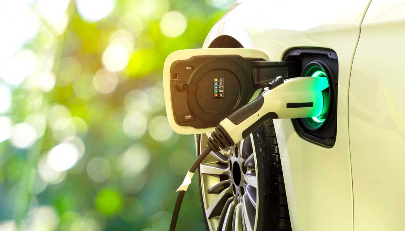 Electric vehicle plugged in