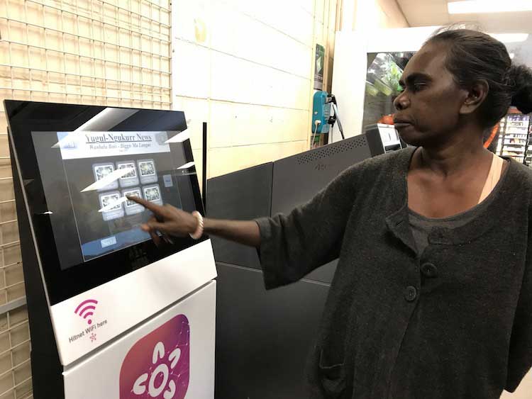Aboriginal lady using a Hitnet Hub terminal